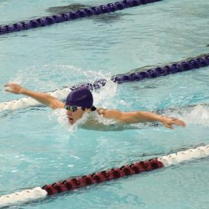 Dolphin swimmer Graham Harris competes in a butterfly event at the Bath meet. STEVE EDWARDS/Boothbay Register