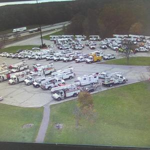 More out-of-state power crews are arriving into Maine to help restore power. This was a noon time photo at the York weigh station off the Maine Turnpike of the crews getting their assignments. Courtesy of Steve McCausland