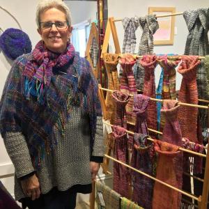 Jill Butke with some of her creations at the Studio 53 Gifts for Giving show on Nov. 18. SUZI THAYER/Boothbay Register