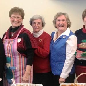 Auxiliary members serving a holiday lunch to the staff of LH St Andrews Campus. From left are Ann Kelley, Carole Zalucky, Holly Smith, Linda Redman, president Irene Gerny, and Anne Butler. Courtesy of Linda Redman