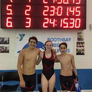 Boothbay Region YMCA Dolphin swim team record-setters, from left, Graham Harris, Evy Case and Marlowe Recoing-Tallen. Courtesy of Bruce Harris