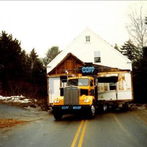 The building donated by Perry Luke for the Hendricks Hill Museum is carefully moved up Route 27 on Southport Island from Ebenecook Road on Feb. 8, 1988. Courtesy of Donald Duncan