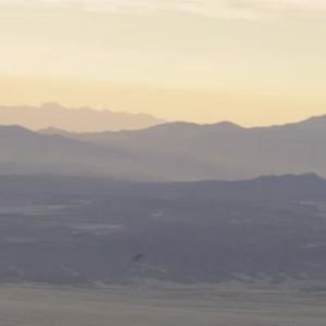 A hiker contemplates the landscape in “Sky Migrations,” a short film featuring a network of scientists and volunteers on the front lines of raptor conservation. The film is part of the Wild & Scenic Film Fest to be hosted by DRA on Feb. 26. Courtesy of DRA