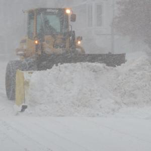 A loader moves snow on Townsend Avenue, Boothbay Harbor, on Thursday afternoon, Jan. 4 during the height of the snowstorm. BILL PEARSON/Boothbay Register