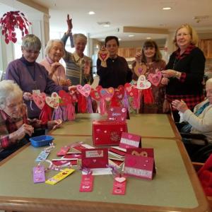 The Garden Therapy group makes Valentines with the Gregory Wing residents. Courtesy of Kathleen Marty.