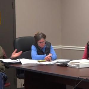 From left, planning board alternates Jon Dunsford and Lee Corbin with east side property owner Jeanne Fuller. Courtesy of BRTV