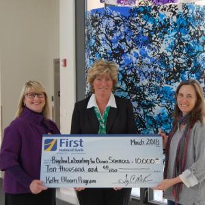 Gathered for a check presentation at Bigelow Laboratory are, from left, Deborah Bronk, president and CEO; Brenda Blackman, branch manager at First National Bank; and Nicole Poulton, research scientist & FAC director. Courtesy photo