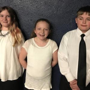 Brianna Bryer, far left, Susie Edwards and Jacob Taylor were among 100 to go to the District 3 Sixth Grade Honors Music Festival at Gardiner Area High School. Courtesy of Genie O’Connell