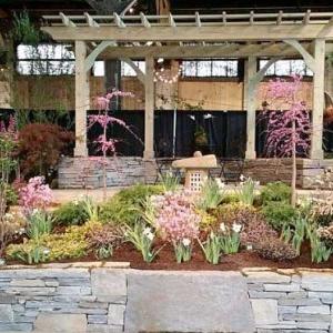 Skillins Greenhouses and Pray's Hardscapes, Inc. were the recipients of the Natural Stone Award, Designers Task Award & Color Palette Award for this entry in 2017. Courtesy of Maine Flower Show
