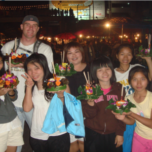Micah Pexa with some of the Friends of Thai Daughters’ family in Chiang Rai, Thailand in 2009 when he volunteered for the organization. In this photo, they are celebrating the Thai holiday Loy Krathong. Boothbay area residents may recognize some of the “daughters” in the photo from their visits over the years. Courtesy of Friends of Thai Daughters