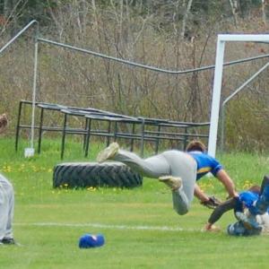 Brothers Cameron and Hunter Crocker dive for a foul ball. ART MAYERS/Boothbay Register