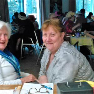 Community Center board members Margaret Jones Perritt, left, and Lucy Cressey enjoy the 2018 Kentucky Derby at the Boothbay Harbor Rotary clubhouse. JANE CARPENTER/Boothbay Register