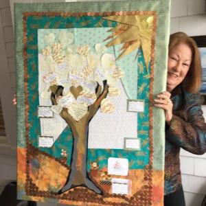 St. Andrews Auxiliary Board member, Laura Zajdel, with "penny poster." Courtesy of Cindy Sanborn
