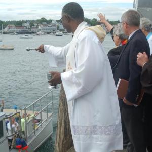 Clergy bless the parade of fishing boats. ART MAYERS/Boothbay Register