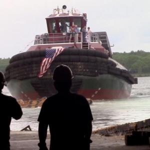 Workers watch as the Judy Moran slips into the water. ART MAYERS/Boothbay Register