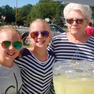 Magen Burge and Lily Nein, pictured with Sue Burge, sell lemonade to benefit homeless veterans ART MAYERS/Boothbay Register