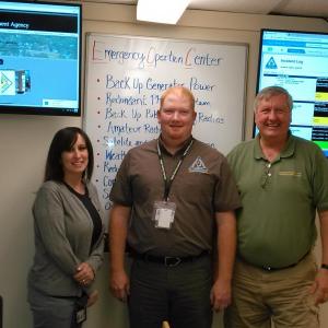From left, Deputy Director of Lincoln County EMA Melissa Temple, Director Casey Stevens and Training and Operations Specialist Ken Desmond open the new emergency operations center July 19. JANE CARPENTER/Boothbay Register