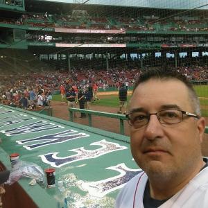 Dennis Dacus, new Boothbay Region High School physical education teacher, attends a Red Sox game. Courtesy photo