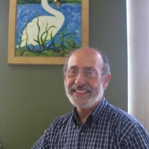 The late artist, Jim Taliana, and a painting of one of his favorite subjects in “Swan” for a show at First Federal Savings many moons ago. File photo Jim Taliana