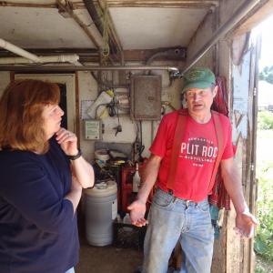 Laura Fortman talks with Newcastle farmer Lee Straw. Courtesy of Barbara Burt