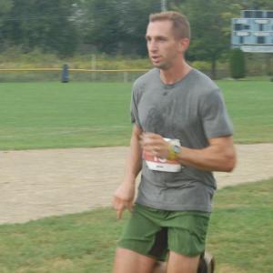 Tim Sick crosses the finish line in the 5k race. ART MAYERS/Boothbay Register
