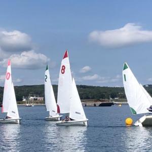 Boothbay sailors (boats 1 and 2) round the weather mark in the lead at Pen Bay. Courtesy of Charles Barclay