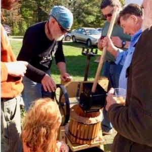 Lincoln County Historical Association volunteers demonstrate the use of a hand-cranked cider press at last year’s event at Pownalborough Court House in Dresden. Courtesy photo