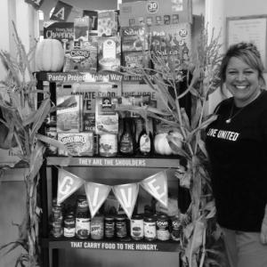 Connie Faulkingham and the food shelf at the Family Care Center in 2016. Courtesy photo