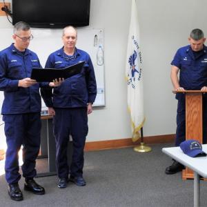 Capt. Brian J. LeFebvre, left, commander, USCG Sector Northern New England, presents the “Coast Guard Auxiliary Commendation Medal” to Coast Guard Auxiliary member Bruce MacCormac (center) at a ceremony held Oct. 5 at USCG. Station Boothbay Harbor. At right is CG Station Boothbay Harbor Officer in Charge, Chief Adam Smart. Coast Guard Auxiliary members routinely serve alongside the active duty Coast Guard and, with training identical to the active duty, may perform virtually any tasks open to the active duty apart from law enforcement or combat. Coast Guard Auxiliary photo by Ted Chatham