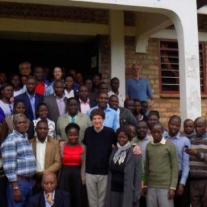 Robert Fritz (tall, white man, front center row) finally meeting many of the people who adopted his creative approach at URDT (Uganda Rural Development and Training Programme) in Uganda. Courtesy of URDT