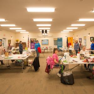 The quilters hard at work in the Rotary Clubhouse. Steve Demeranville photo