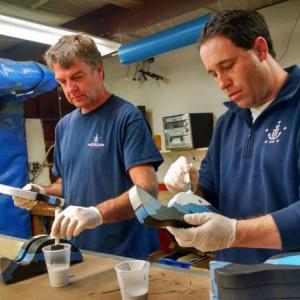 Hodgdon Yacht Services employees, including Don Oakman, left, and Chad Jones are building 150 handmade toys for Toys for Tots. MARGARET HOFFMAN/Boothbay Register