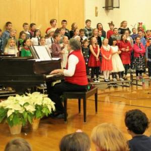 “We Wish You A Merry Christmas” - the finale sung by grades K-4 with accompaniment by Genie O’Connell. LISA KRISTOFF/Boothbay Register