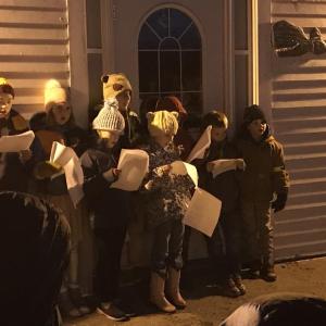 Southport Central School carolers, front from left:: Georgia Griffith and Stella Stevens; back row, from left: Sage Wickline, Pippa Schoenthal, Cameron Payson, Alex Heil (partially hidden), Liam Scott and Grady Gamage. KELLIE BIGOS/Boothbay Register