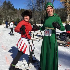 Biathlon skiers in costume. Courtesy of Midcoast Conservancy