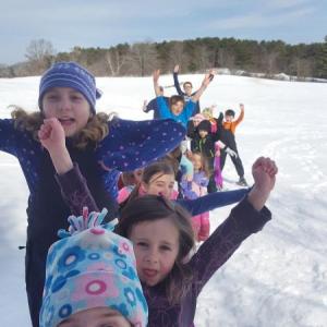 Kids enjoy a snowshoe hike at Damariscotta River Association’s winter day camp. Courtesy of DRA