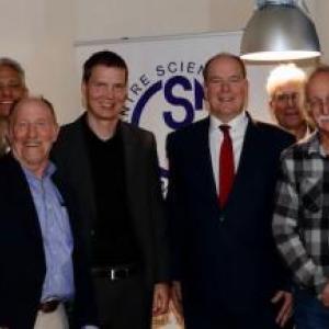 Coral reef experts from seven countries attended the Ocean Solution Initiative in Monaco. The meeting was convened by Prince Albert II of Monaco, center with red tie. UMaine professor Bob Steneck is center with blue shirt. Courtesy of Darling Marine Center