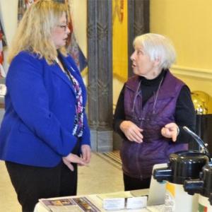 Discussing the new "Roadtrip" film with her state representative Holly Stover, Andy Burt points out how kelp research happening in Rep. Stover's district and elsewhere is demonstrating the many benefits the marine plant has for Maine's shellfish industry. Courtesy photo
