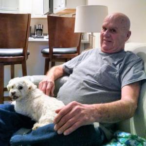 Fogg and his dog Squirt relax in their temporary housing provided by the Boothbay Harbor Country Club. MARGARET HOFFMAN/Boothbay Register