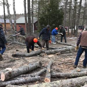 Woodchucks and Boothbay Region Fish & Game Association members cutting down trees at the BRF&G property on Jan. 26. Ben Borkowski photo