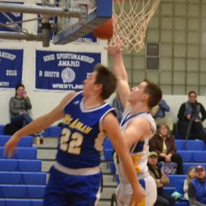 Boothbay forward Hunter Crocker seeks a rebound Jan. 31 in his team’s 81-55 victory over Mount Abram at Porter Gymnasium. BILL PEARSON/Boothbay Register