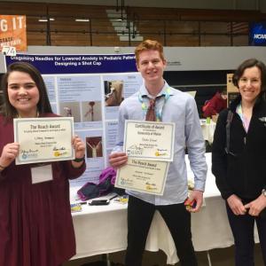 Lilley Harris, left, and Blake Erhard stand with teacher Emily Higgins with their certificates for the first place prize in the biomedical and health science category. Courtesy of Kerrin Erhard