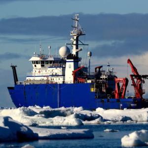 The research vessel Sikuliaq navigates ice during an expedition to study nitrogen processes. Researchers have revealed that the partnership between an alga and bacteria is making the essential element newly available in the Arctic Ocean. Kim Kenny photo