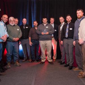 Three Boothbay municipal officials joined representatives of Sargent Construction in Stillwater and Sebago Technics April 10 in accepting the 2019 Build Maine Award for the Route 27 Redevelopment Project. Boothbay officials pictured are far left, Public Works Director Mike Alley; far right, Town Manager Dan Bryer; and middle, Selectman Dale Harmon. Courtesy of Sargent Construction