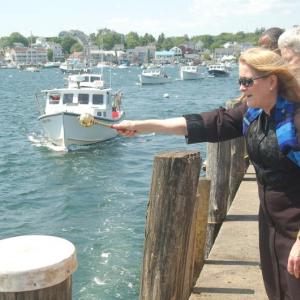 The Reverend Doctor Sarah Foulger blesses the fleet. ART MAYERS/Boothbay Register