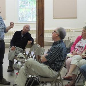 At a June 12 special town meeting in Southport, Revision Energy consultant Andrew Karl explains his firm’s recent feasibility study on how a solar panel array would save taxpayers money. BILL PEARSON/Boothbay Register