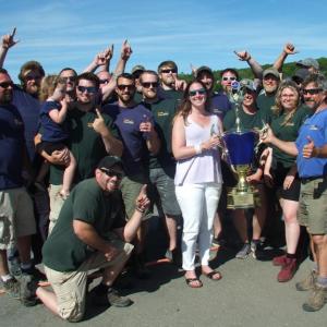 Who’s number one, two years running? Clear Stream Construction, that’s who! Stephanie Branch, center, returns the first place trophy to the team. LISA KRISTOFF/Boothbay Register