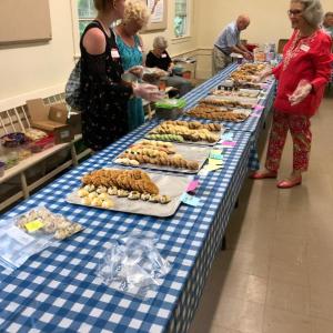 Nancy Harriman, left, and her volunteers package up cookies for attendees at Southport Country Fair. CRAIG LANCASTER/Boothbay Register Southport, Southport Country Fair, Southport Town Hall, Southport United Methodist Church