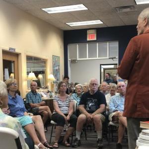 Richard Ford speaks to more than 60 attendees at the Community Center July 17. Courtesy photo