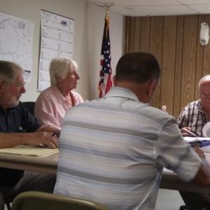 Tim Forrester (back to camera), founder and owner of Atlantic Environmental, LLC, speaks to the Edgecomb Planning Board Aug. 1 about a proposed shoreland dock at 79 Fort Road. JANE CARPENTER/Boothbay Register